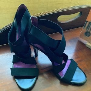 Tahari black scrappy sandals.